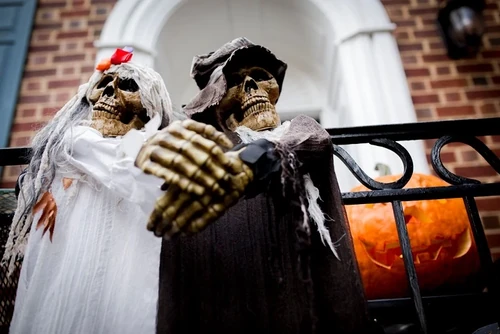 A close-up of Halloween decorations outside of a building.
