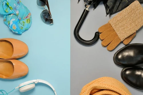 A spread of seasonal items with winter gear in the right, grey area, and summer items in the left, blue area.